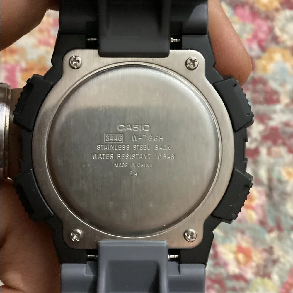 Casio Black Digital Vibration Alarm Watch with Blue Accent